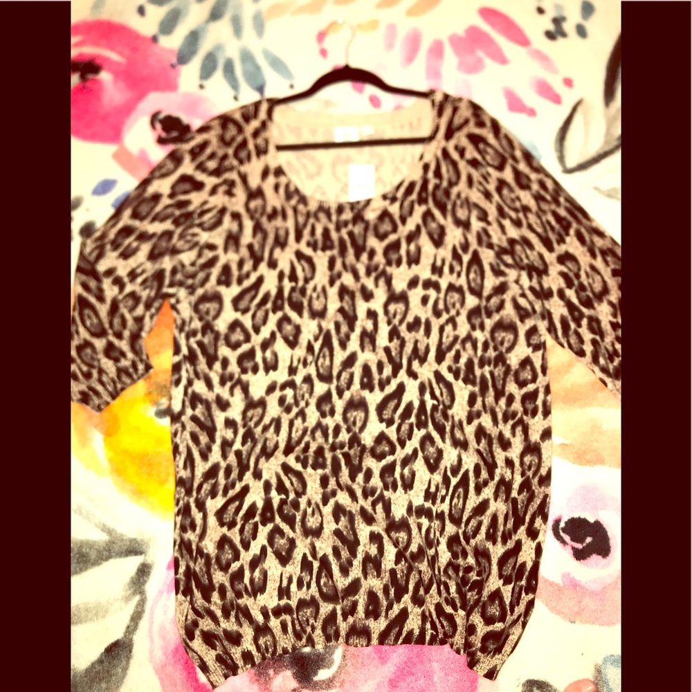 A MUST HAVE animal print sweater.